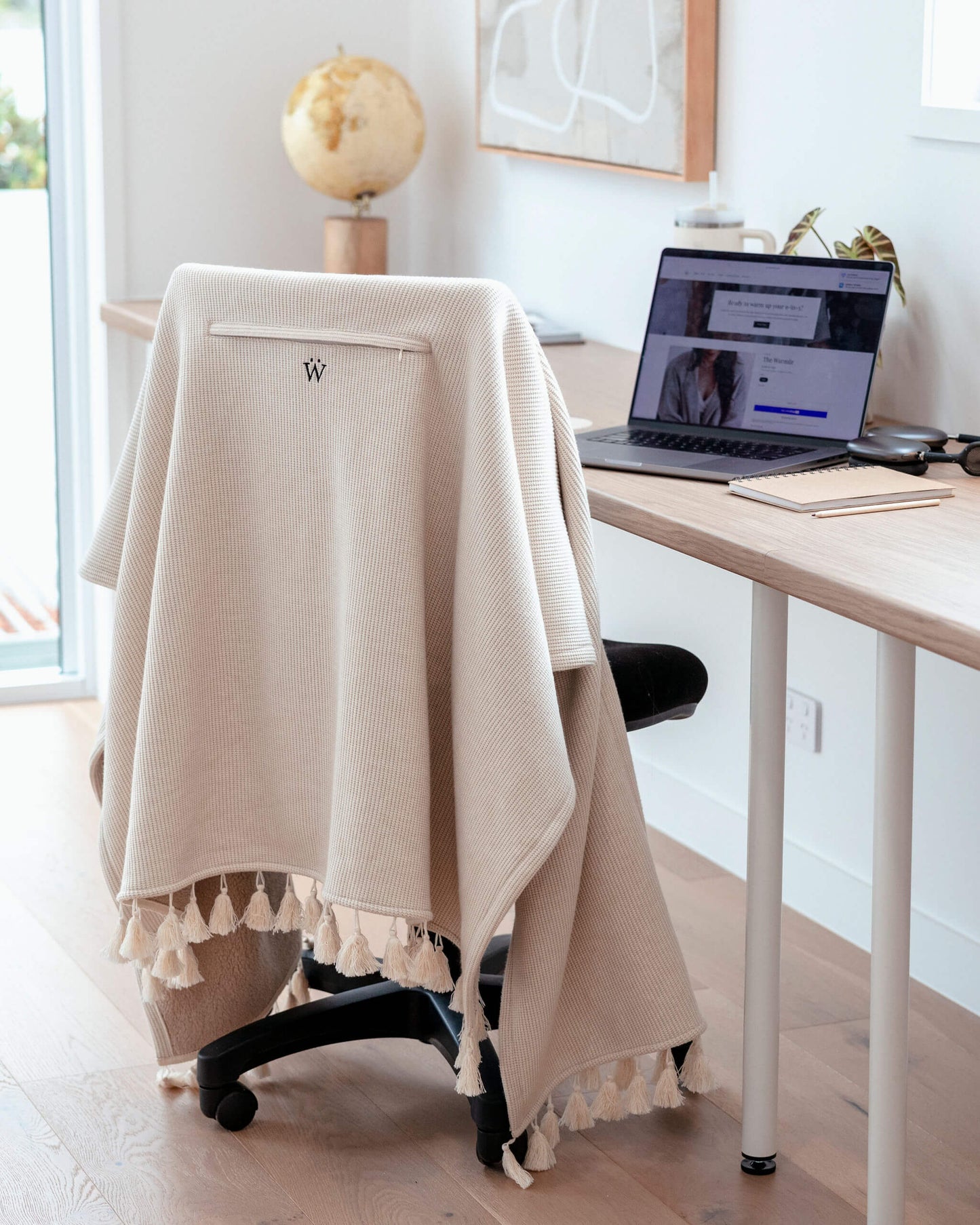 Workday essential beige Warmür office chair blanket for productivity and comfort in cold offices.