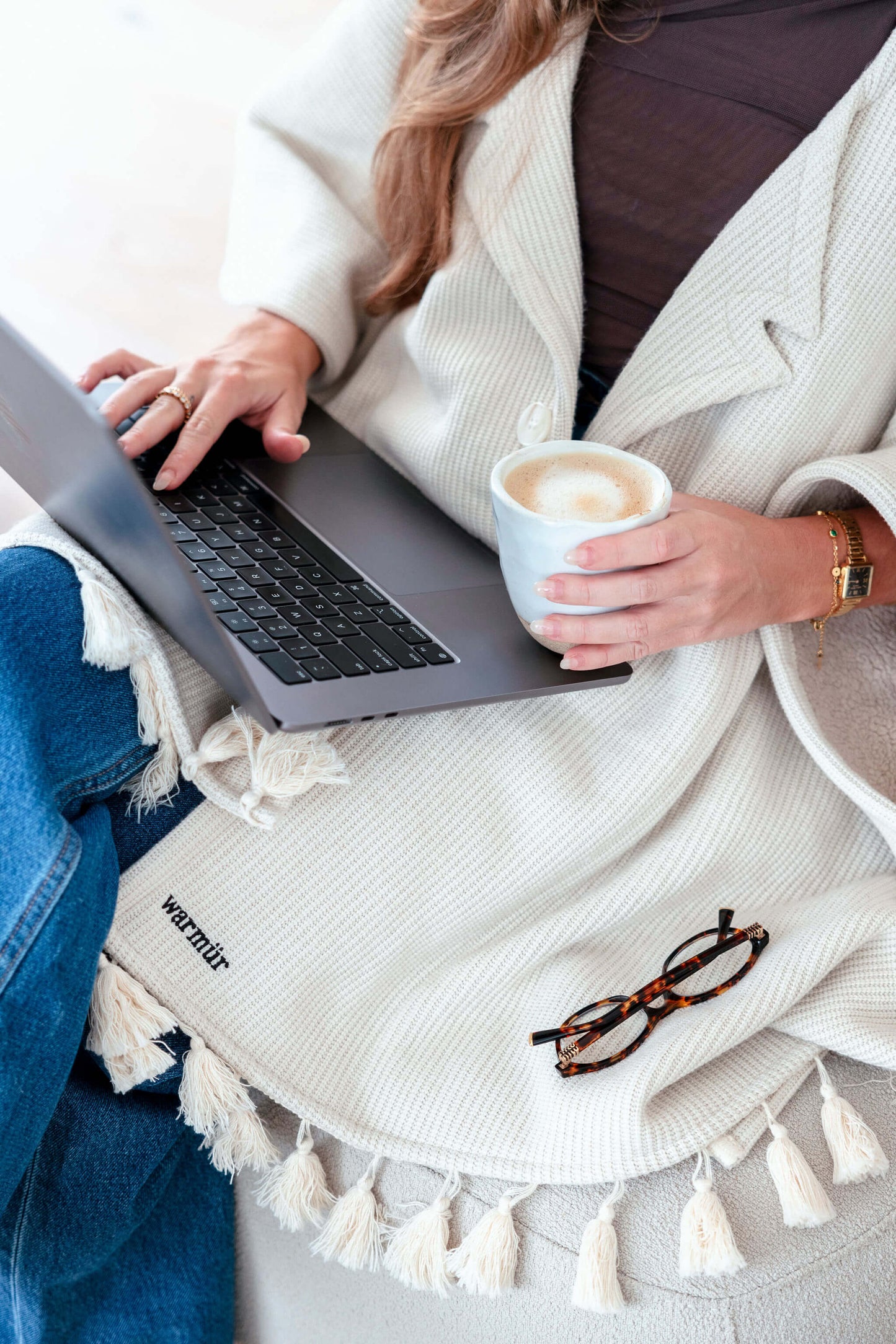 Comfortable beige office wrap that keeps you warm while maintaining a professional look.